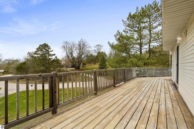 Nice 2 bedroom, 2 bath home that has seasonal views of Crystal on Crystal Lake Golf Club in Michigan - for sale on GolfHomes.com, golf home, golf lot