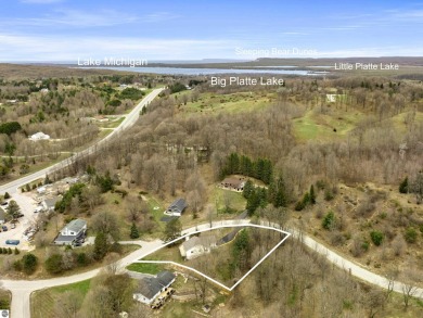 Nice 2 bedroom, 2 bath home that has seasonal views of Crystal on Crystal Lake Golf Club in Michigan - for sale on GolfHomes.com, golf home, golf lot