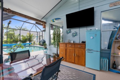 FANTASTIC MOVE IN READY POOL HOME with AWESOME REAR VIEW of HOLE on Heritage Pines Country Club in Florida - for sale on GolfHomes.com, golf home, golf lot