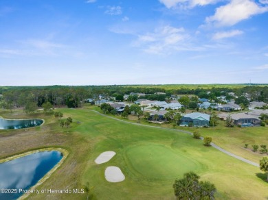 FANTASTIC MOVE IN READY POOL HOME with AWESOME REAR VIEW of HOLE on Heritage Pines Country Club in Florida - for sale on GolfHomes.com, golf home, golf lot
