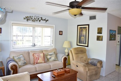 This is a really wonderful condo for someone who loves the sun! on Sunrise Lakes Phase III in Florida - for sale on GolfHomes.com, golf home, golf lot