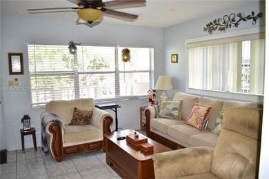 This is a really wonderful condo for someone who loves the sun! on Sunrise Lakes Phase III in Florida - for sale on GolfHomes.com, golf home, golf lot