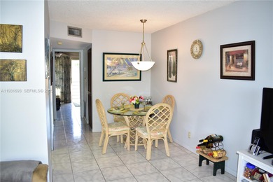 This is a really wonderful condo for someone who loves the sun! on Sunrise Lakes Phase III in Florida - for sale on GolfHomes.com, golf home, golf lot