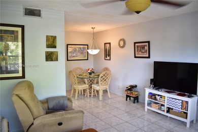 This is a really wonderful condo for someone who loves the sun! on Sunrise Lakes Phase III in Florida - for sale on GolfHomes.com, golf home, golf lot