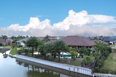 Stunning 3-bedroom, 2.5-bath lakefront home offers the perfect on South Padre Island Golf Club in Texas - for sale on GolfHomes.com, golf home, golf lot