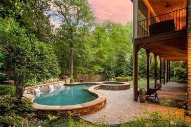 Just steps from Chastain Park, this exceptional five-bedroom on North Fulton Golf Course in Georgia - for sale on GolfHomes.com, golf home, golf lot