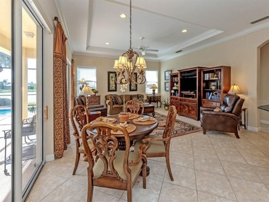 Welcome home to easy Florida living with peaceful lake views on Venetian Golf and River Club in Florida - for sale on GolfHomes.com, golf home, golf lot