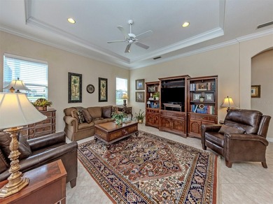 Welcome home to easy Florida living with peaceful lake views on Venetian Golf and River Club in Florida - for sale on GolfHomes.com, golf home, golf lot