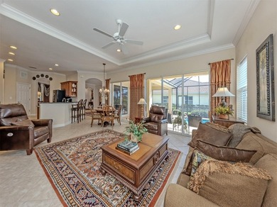 Welcome home to easy Florida living with peaceful lake views on Venetian Golf and River Club in Florida - for sale on GolfHomes.com, golf home, golf lot