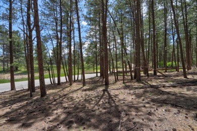 Just across the street from Monte Verde Lake, this gently sloped on Angel Fire Resort Country Club in New Mexico - for sale on GolfHomes.com, golf home, golf lot