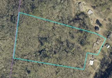+9.7 unrestricted acres bordering Cherokee land and a on Smoky Mountain Country Club in North Carolina - for sale on GolfHomes.com, golf home, golf lot