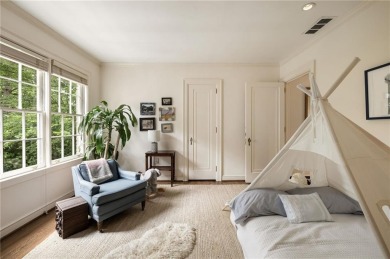 Tucked in the heart of Haynes Manor, this timeless traditional on Bobby Jones Golf Club in Georgia - for sale on GolfHomes.com, golf home, golf lot