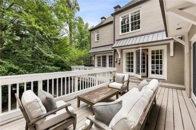 Tucked in the heart of Haynes Manor, this timeless traditional on Bobby Jones Golf Club in Georgia - for sale on GolfHomes.com, golf home, golf lot