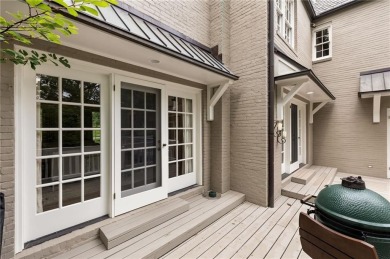 Tucked in the heart of Haynes Manor, this timeless traditional on Bobby Jones Golf Club in Georgia - for sale on GolfHomes.com, golf home, golf lot