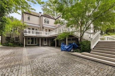 Tucked in the heart of Haynes Manor, this timeless traditional on Bobby Jones Golf Club in Georgia - for sale on GolfHomes.com, golf home, golf lot
