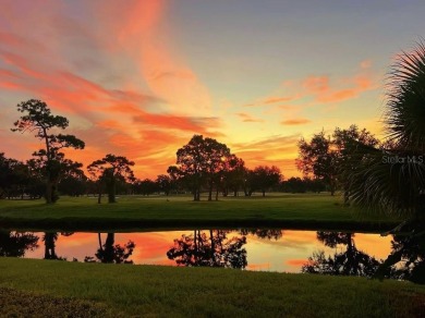 Experience the relaxation of maintenance free living in Palm on Palm Aire Country Club of Sarasota in Florida - for sale on GolfHomes.com, golf home, golf lot