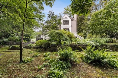 Tucked in the heart of Haynes Manor, this timeless traditional on Bobby Jones Golf Club in Georgia - for sale on GolfHomes.com, golf home, golf lot