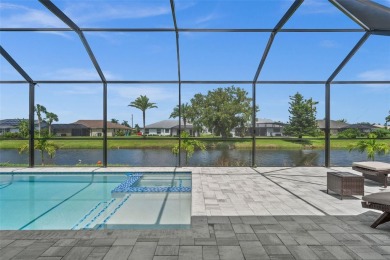 MODERN living in this brand-new Rotonda West residence is proof on Rotonda Golf and Country Club The Palms Course in Florida - for sale on GolfHomes.com, golf home, golf lot