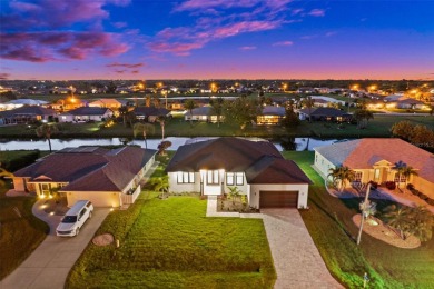 MODERN living in this brand-new Rotonda West residence is proof on Rotonda Golf and Country Club The Palms Course in Florida - for sale on GolfHomes.com, golf home, golf lot