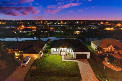 MODERN living in this brand-new Rotonda West residence is proof on Rotonda Golf and Country Club The Palms Course in Florida - for sale on GolfHomes.com, golf home, golf lot