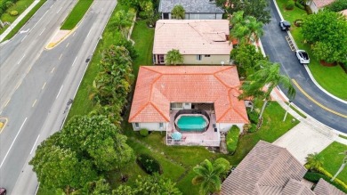 Spacious 3 bed, 3 bath home with private pool located in the on Woodmont Country Club in Florida - for sale on GolfHomes.com, golf home, golf lot