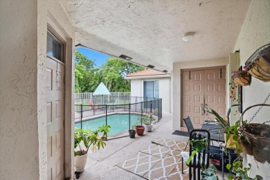 Spacious 3 bed, 3 bath home with private pool located in the on Woodmont Country Club in Florida - for sale on GolfHomes.com, golf home, golf lot