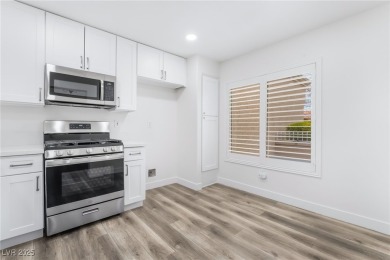 Beautifully remodeled modern-style townhome in the sought-after on Highland Falls Golf Club in Nevada - for sale on GolfHomes.com, golf home, golf lot
