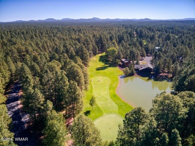 Located on the 11th fairway of Pinetop Lakes Golf and Country on Pinetop Lakes Golf and Country Club in Arizona - for sale on GolfHomes.com, golf home, golf lot