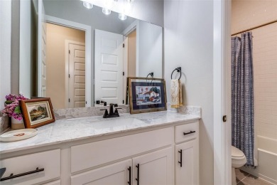 Executive 3 bedroom, 2 and a half bathroom home with an attached on Royal Oaks Country Club in Texas - for sale on GolfHomes.com, golf home, golf lot