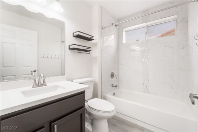 Beautifully remodeled modern-style townhome in the sought-after on Highland Falls Golf Club in Nevada - for sale on GolfHomes.com, golf home, golf lot