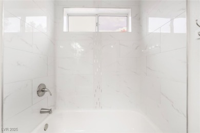 Beautifully remodeled modern-style townhome in the sought-after on Highland Falls Golf Club in Nevada - for sale on GolfHomes.com, golf home, golf lot