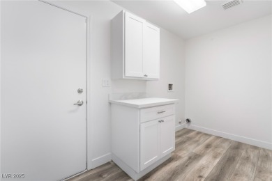Beautifully remodeled modern-style townhome in the sought-after on Highland Falls Golf Club in Nevada - for sale on GolfHomes.com, golf home, golf lot