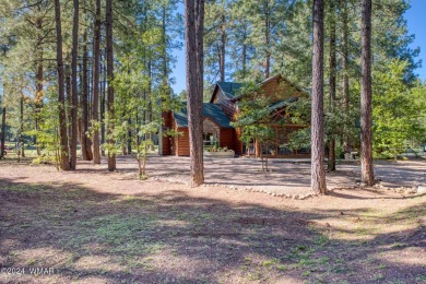 Located on the 11th fairway of Pinetop Lakes Golf and Country on Pinetop Lakes Golf and Country Club in Arizona - for sale on GolfHomes.com, golf home, golf lot