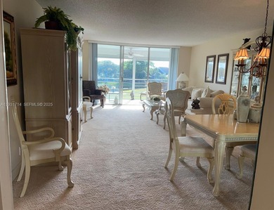 Prime corner 3BD/2BA residence featuring one of the largest on Palm-Aire Country Club and Resort - The Oaks in Florida - for sale on GolfHomes.com, golf home, golf lot