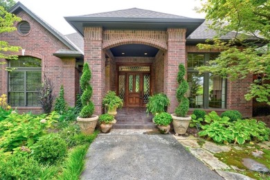 Exquisitely crafted custom residence on the 12th fairway of the on Oak Tree National Golf and Country Club in Oklahoma - for sale on GolfHomes.com, golf home, golf lot