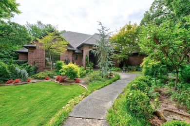 Exquisitely crafted custom residence on the 12th fairway of the on Oak Tree National Golf and Country Club in Oklahoma - for sale on GolfHomes.com, golf home, golf lot