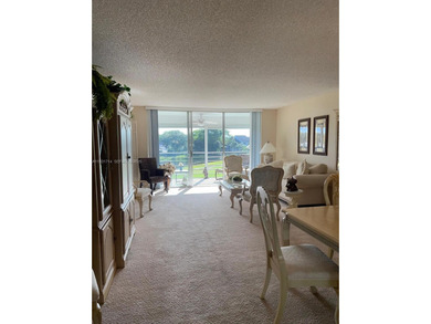 Prime corner 3BD/2BA residence featuring one of the largest on Palm-Aire Country Club and Resort - The Oaks in Florida - for sale on GolfHomes.com, golf home, golf lot