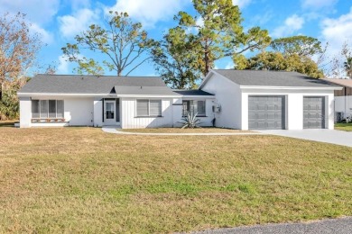 Incredible 3-bedroom/2-bathroom home with a large, attached on Palm Harbor Golf Club in Florida - for sale on GolfHomes.com, golf home, golf lot