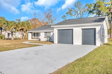 Incredible 3-bedroom/2-bathroom home with a large, attached on Palm Harbor Golf Club in Florida - for sale on GolfHomes.com, golf home, golf lot