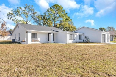 Incredible 3-bedroom/2-bathroom home with a large, attached on Palm Harbor Golf Club in Florida - for sale on GolfHomes.com, golf home, golf lot