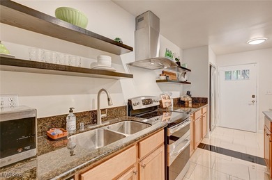 Rarely Available One-Story End-Unit Brick Townhome adjacent to on Las Vegas Country Club in Nevada - for sale on GolfHomes.com, golf home, golf lot