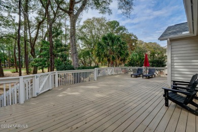 This 3 bedroom, 2 and a half bathroom home sits on over a half on Sea Trail Golf Resort in North Carolina - for sale on GolfHomes.com, golf home, golf lot