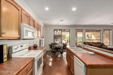 Versatile Spyglass Model w/ Golf Cart garage in the GATED, ADULT on Oakwood Golf Club  in Arizona - for sale on GolfHomes.com, golf home, golf lot