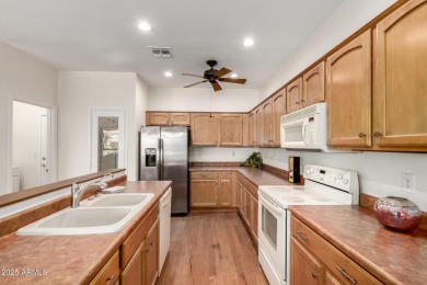Versatile Spyglass Model w/ Golf Cart garage in the GATED, ADULT on Oakwood Golf Club  in Arizona - for sale on GolfHomes.com, golf home, golf lot