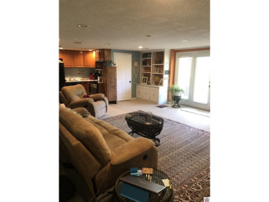 Spacious and inviting 2-bedroom, 1.5-bath walk-out basement on Mayfield-Graves Country Club in Kentucky - for sale on GolfHomes.com, golf home, golf lot
