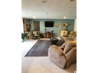 Spacious and inviting 2-bedroom, 1.5-bath walk-out basement on Mayfield-Graves Country Club in Kentucky - for sale on GolfHomes.com, golf home, golf lot