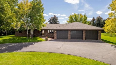 Set on .55 acres along the 16th hole of Olive Glenn Golf Course on Olive Glenn Golf and Country Club in Wyoming - for sale on GolfHomes.com, golf home, golf lot