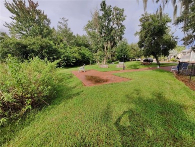 Prime Opportunity in The Woods: Upscale Gated on The Groves Golf and Country Club in Florida - for sale on GolfHomes.com, golf home, golf lot