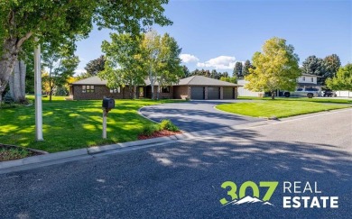 Set on .55 acres along the 16th hole of Olive Glenn Golf Course on Olive Glenn Golf and Country Club in Wyoming - for sale on GolfHomes.com, golf home, golf lot