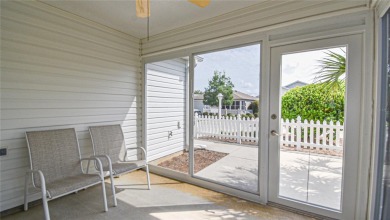 BOND PAID AND MOVE IN READY!  THIS DARLING COLONY PATIO VILLA on Roosevelt Executive Golf Course in Florida - for sale on GolfHomes.com, golf home, golf lot